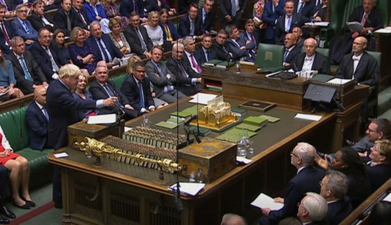 In this handout photo provided by the House of Commons, Britain's Prime Minister Boris Johnson speaks in Parliament in London.