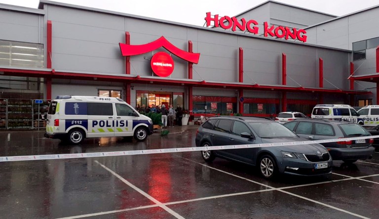 Police attend the scene of a violent incident at the Hermanni shopping centre in Kuopio, Finland, on Tuesday. Finnish police say that a man with a knife has killed one person and wounded at least three others at a shopping center in central Finland.