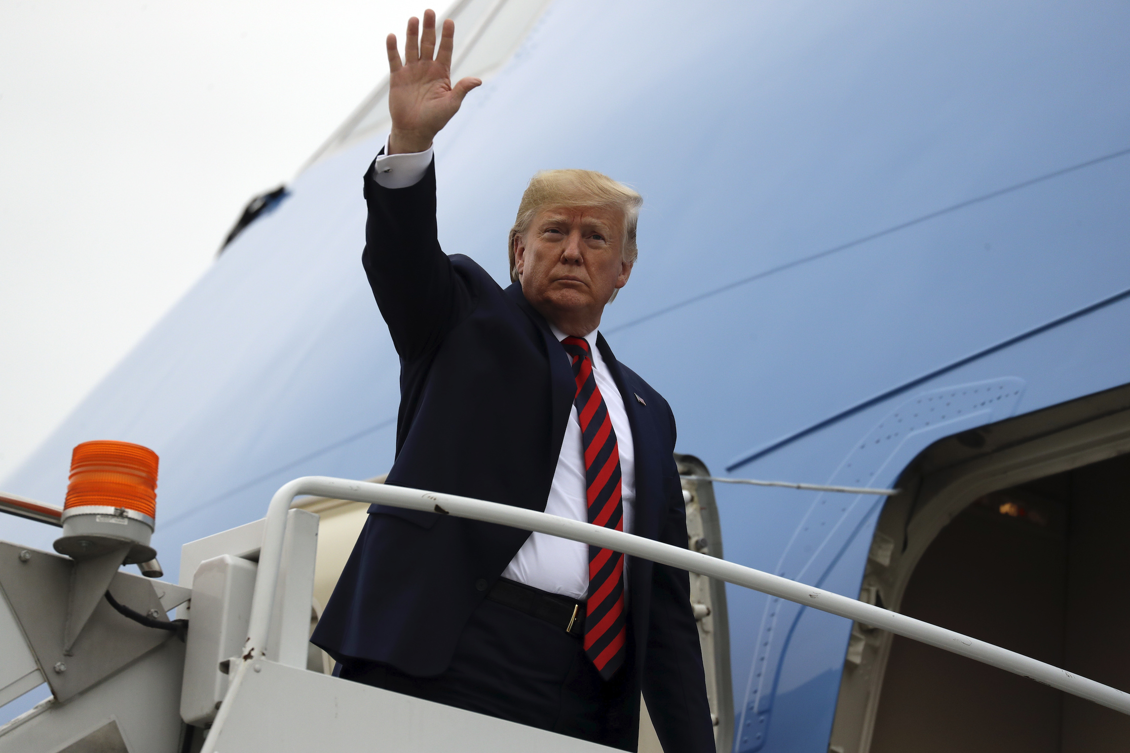 Trump invites high school football players suspended after honoring 9/11 first responders onstage during rally