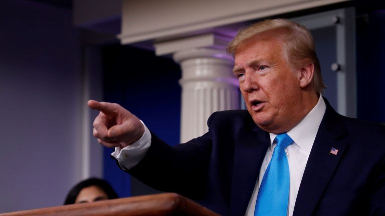 Trump says he didn’t see Navarro coronavirus warnings as he defends early response
