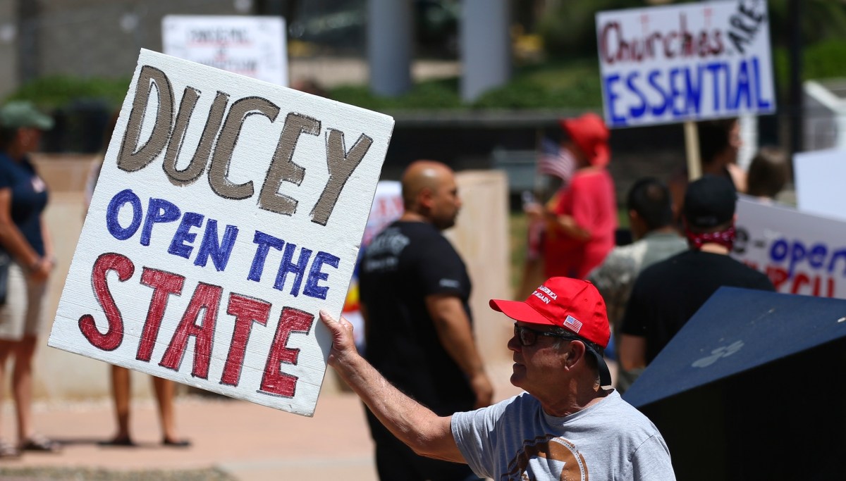Hundreds gather around Arizona Capitol to protest shutdowns