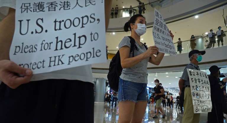 Trump promises to act on China over Hong Kong this week