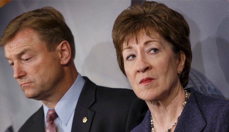 Sen. Susan Collins, R-Maine, joined by Sen. Dean Heller, R-Nev., speak at a news conference at the Capitol in Washington, Tuesday, Jan. 14, 2014. 