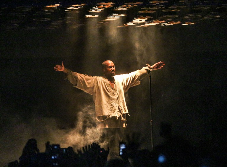 Kanye West performs during a concert in Los Angeles.