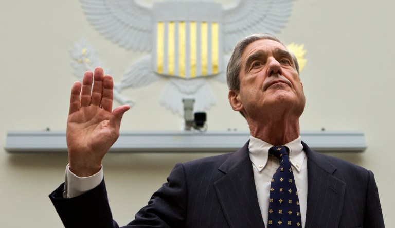 Robert Mueller is sworn in during the start of a hearing on on Capitol Hill in Washington.