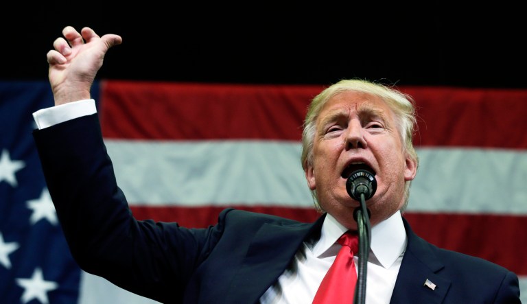 Republican presidential candidate Donald Trump speaks during a rally at Griffiss International Airport on Tuesday, April 12, 2016, in Rome, N.Y. 