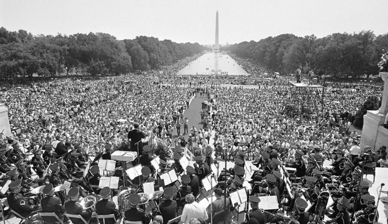 This is a general view of musicians and the huge crowd that turned out in Washington, July 4, 1970 as the Rev. Billy Graham speaks from the Lincoln Memorial.  