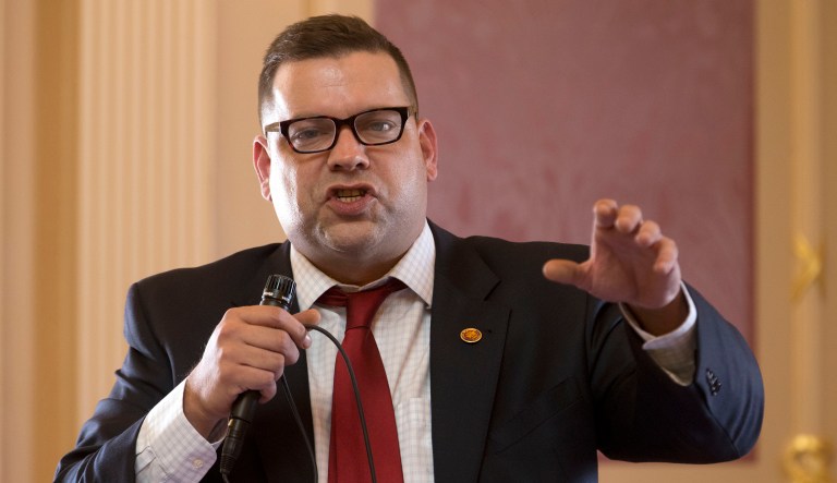 How does Tom Garrett’s alcoholism have anything to do with what’s really driving him out of office?