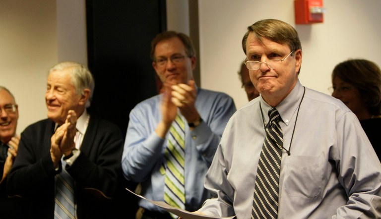 Executive Editor of the Washington Post Leonard Downie Jr., right, announces the paper was awarded six Pulitzer Prizes.