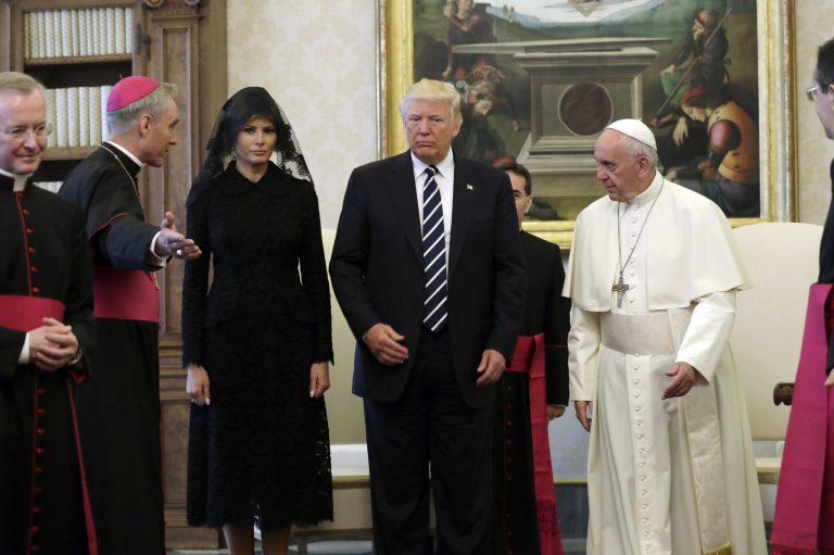 FILE - In this May 24, 2017 file-pool photo, President Donald Trump and first lady Melania Trump meet with Pope Francis at the Vatican.