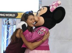 Hugs and interactions with characters returning to Disney parks