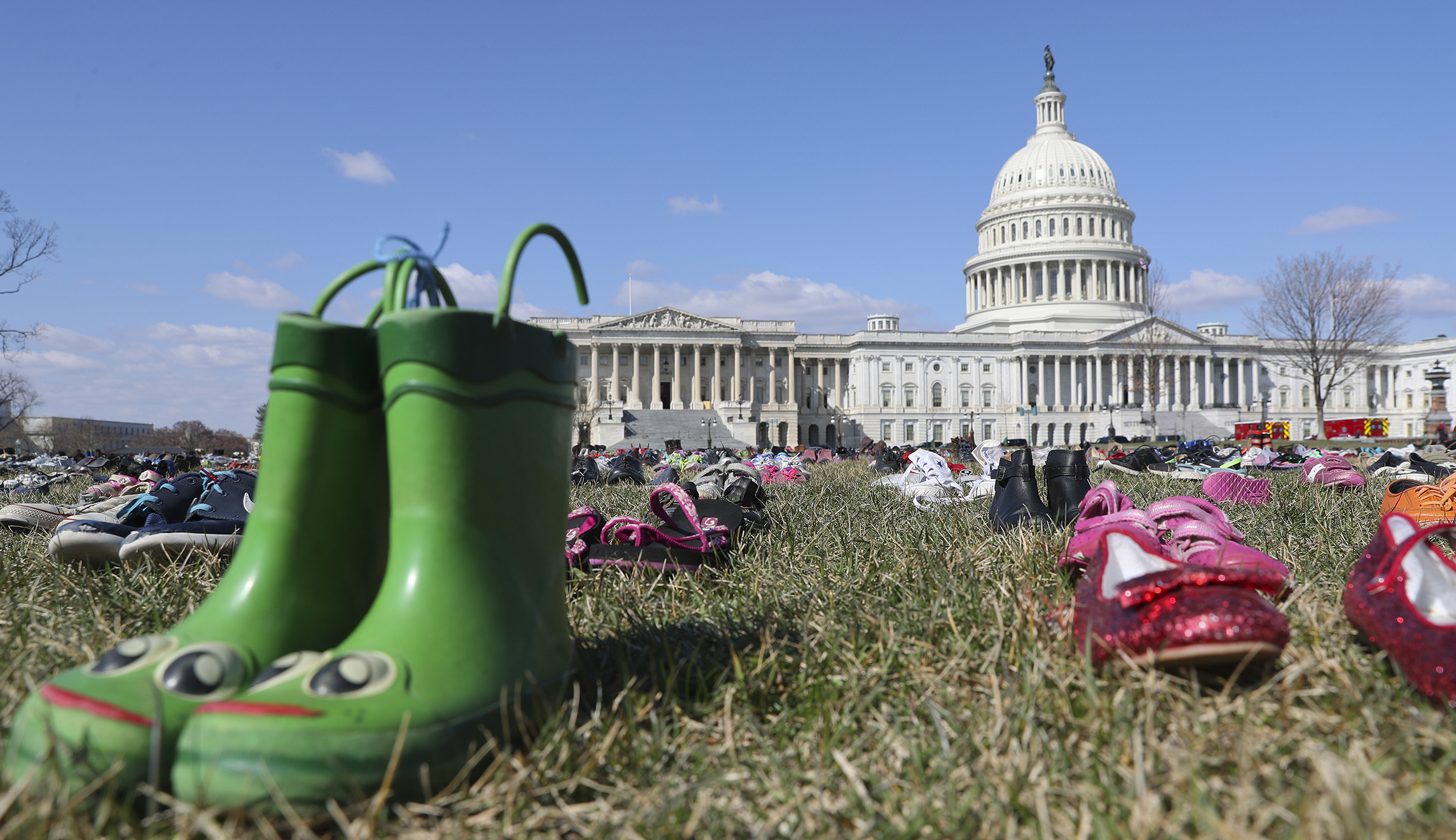 7,000 pairs of shoes cover the Capitol grounds to memorialize kids killed by gun violence