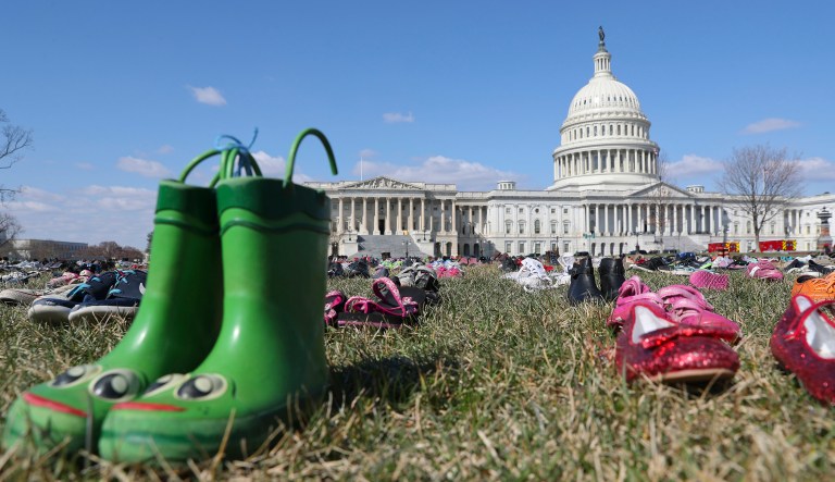 7,000 pairs of shoes, one for every child killed by gun violence since the Sandy Hook school shooting, were placed on the Capitol lawn by Avaaz, a U.S.-based civic organization, on Tuesday.
