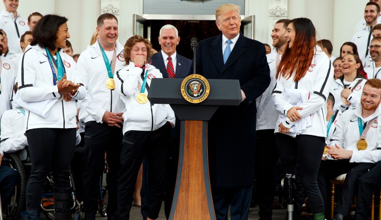 President Trump jokes with Olympic snowboarding gold medalist Redmond Gerard during an event with the United States Olympic and Paralympic Teams at the White House.