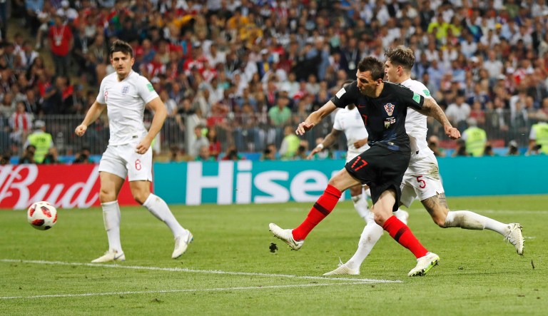 Croatia's Mario Mandzukic, second right, scores his side's second goal during the semifinal match between Croatia and England at the 2018 soccer World Cup in the Luzhniki Stadium in Moscow, Russia, Wednesday, July 11, 2018.