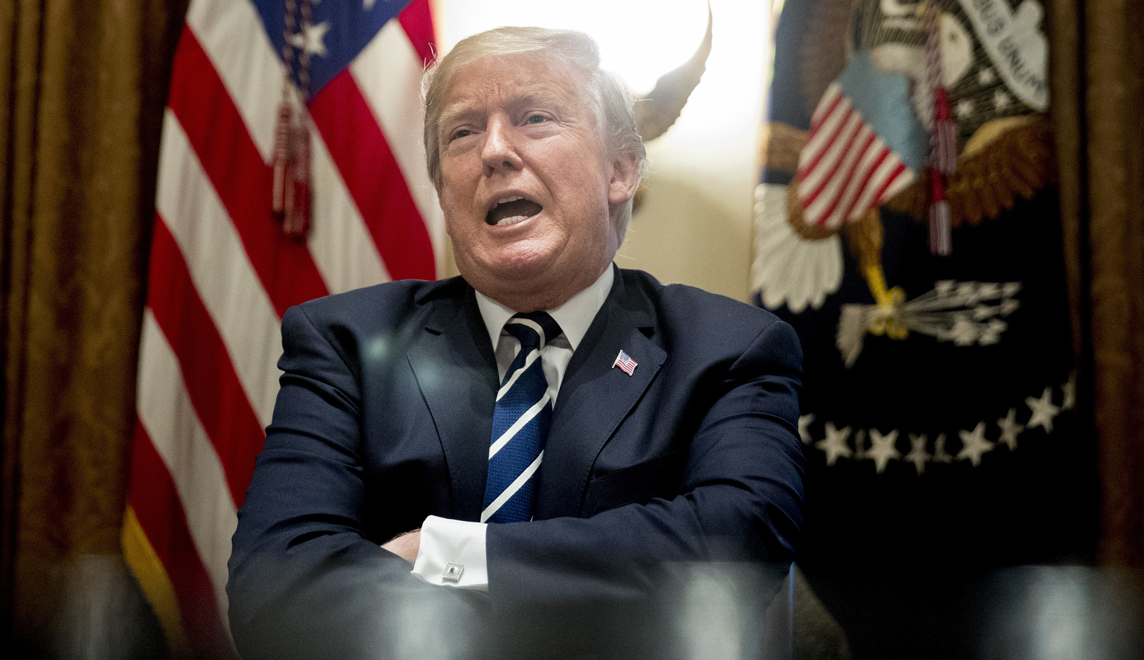 Trump says he misspoke, accepts US intelligence on Russian meddling