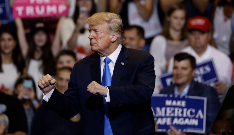 President Trump departs from a campaign rally. 