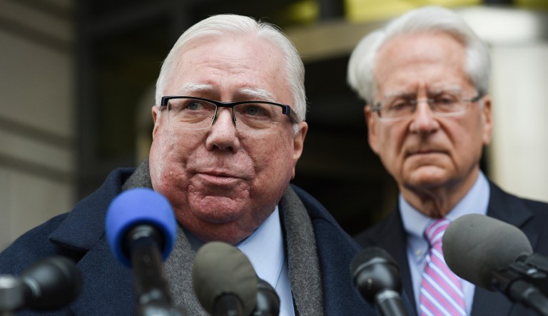 Jerome Corsi, left, speaks during a news conference as his lawyer Larry Klayman stands behind him outside the federal courthouse in Washington, Thursday, Jan. 3, 2019. 