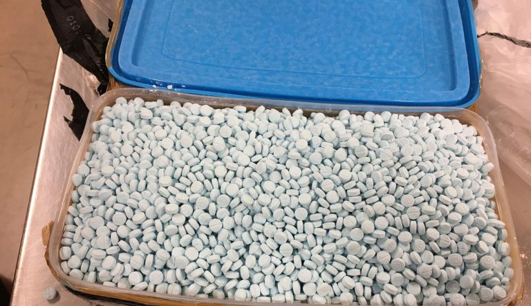 This photo provided by the U.S. Drug Enforcement Administration's Phoenix Division shows some of the 30,000 fentanyl pills the agency seized in one of its bigger busts, in Tempe, Ariz., in August, 2017. 