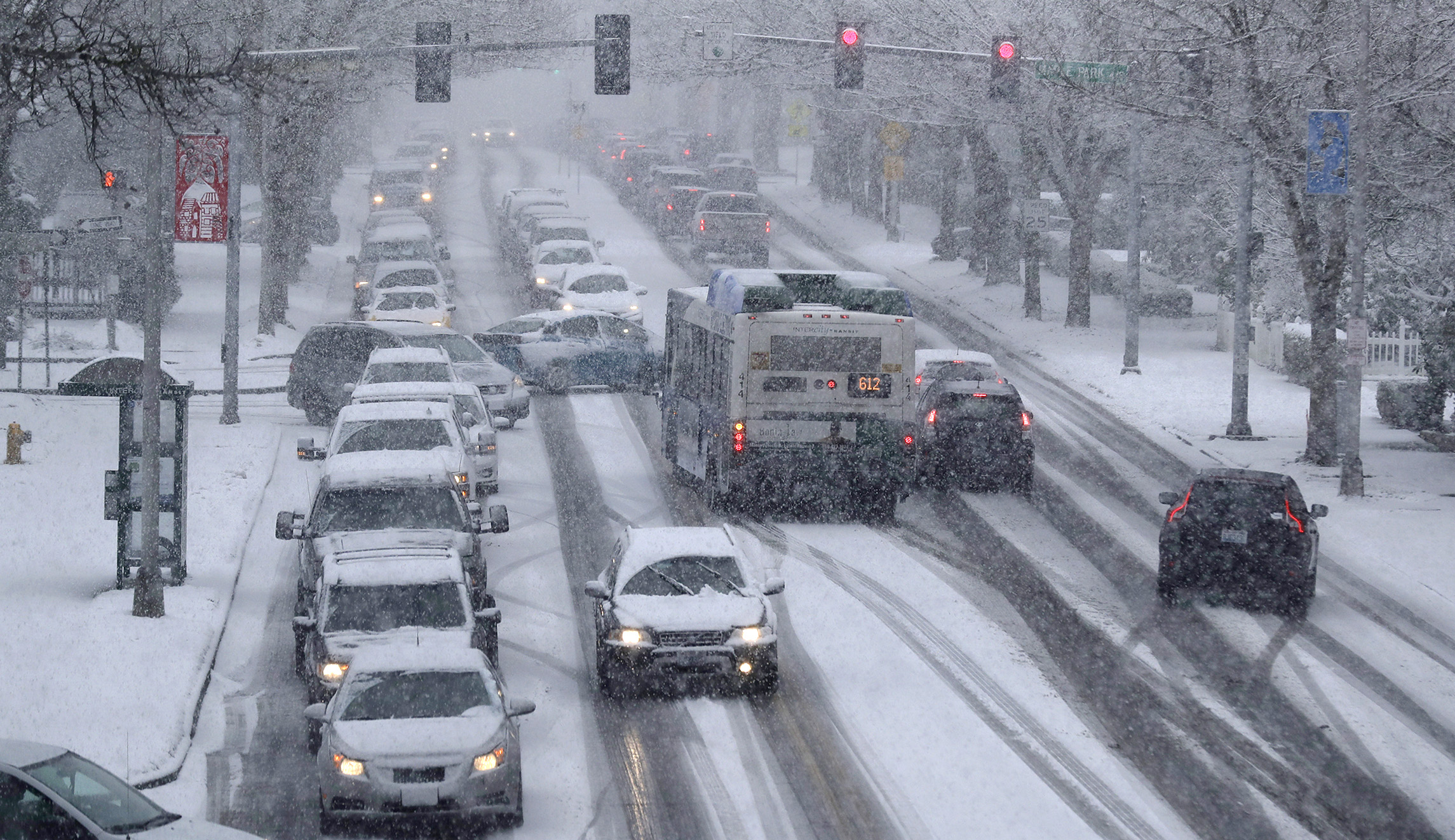 Snowstorm wallops Seattle, people rescued in Sierra Nevada