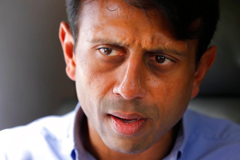 In this July 20, 2010 file photo, Louisiana Gov. Bobby Jindal talks about the oil spill as he flies over the Deepwater Horizon oil spill site in the Gulf of Mexico, off the Louisiana coast.Â Jindal left the Louisiana governorâs office nearly four years ago and evaporated from the state political scene after a failed presidential bid. Still, heâs a permanent fixture in the current governorâs race. Democratic incumbent John Bel Edwards keeps his Republican predecessor front and center in his quest for a second term. Edwards frames his GOP opponents as another version of Jindal, whose financial policies are blamed for the stateâs past decade of budget troubles.