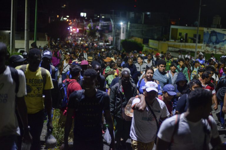 Migrants depart early in the morning from Tapachula, Chiapas state, Mexico, Saturday Oct. 12, 2019. Migrants from Africa, Cuba, Haiti, and other Central American countries set off early morning by foot from Tapachula to the southern border of the United States.