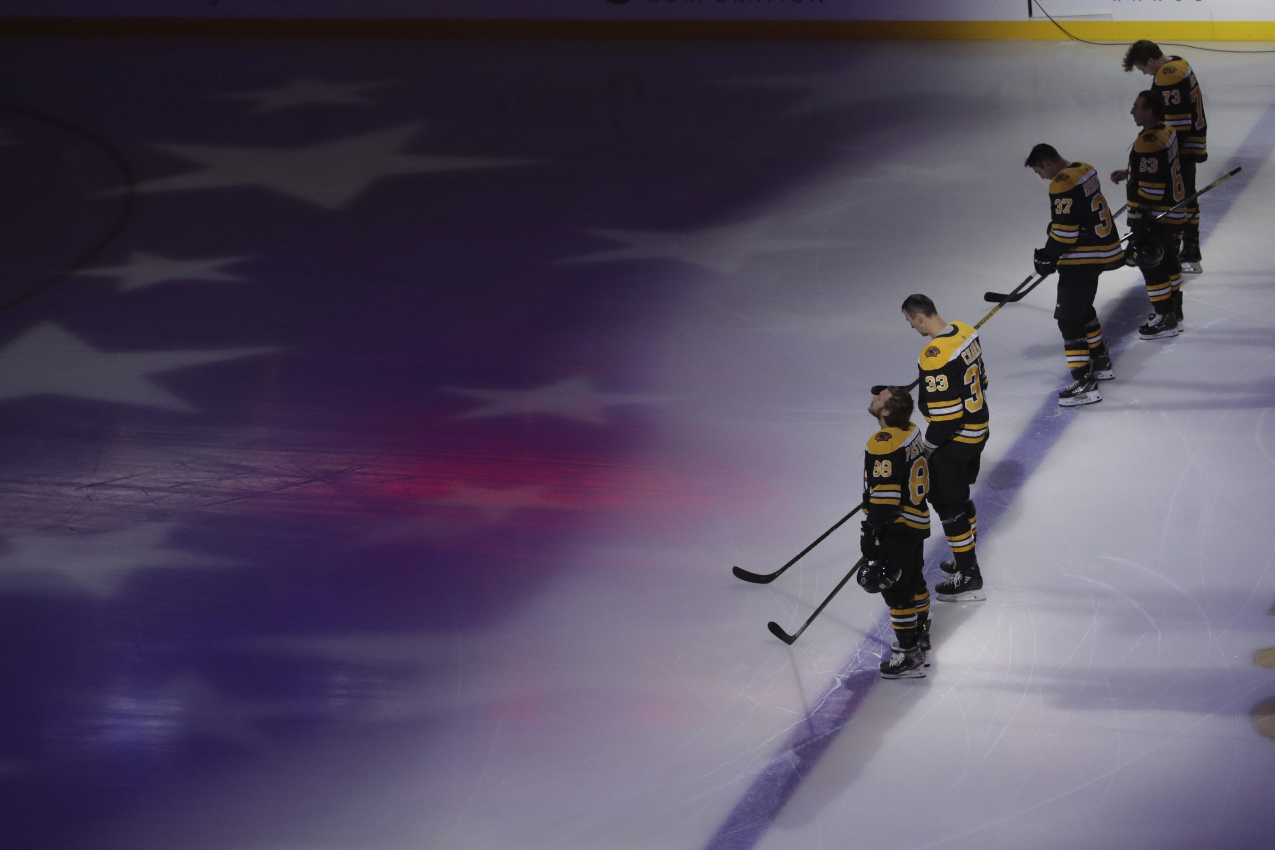 Every NHL player stands for national anthem during season restart, but some lock arms as sign of unity