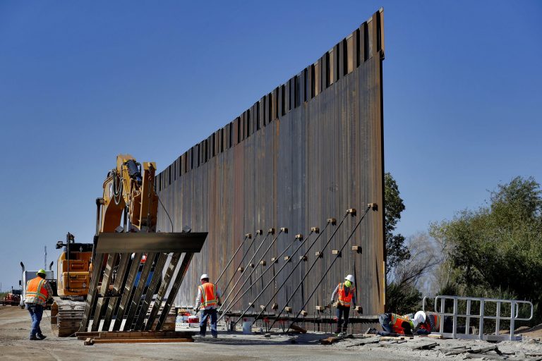 Contractors last Septemberg erect a section of Pentagon-funded border wall along the Colorado River in Yuma, Ariz.