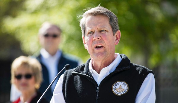 Brian Kemp signs sweeping elections bill into law