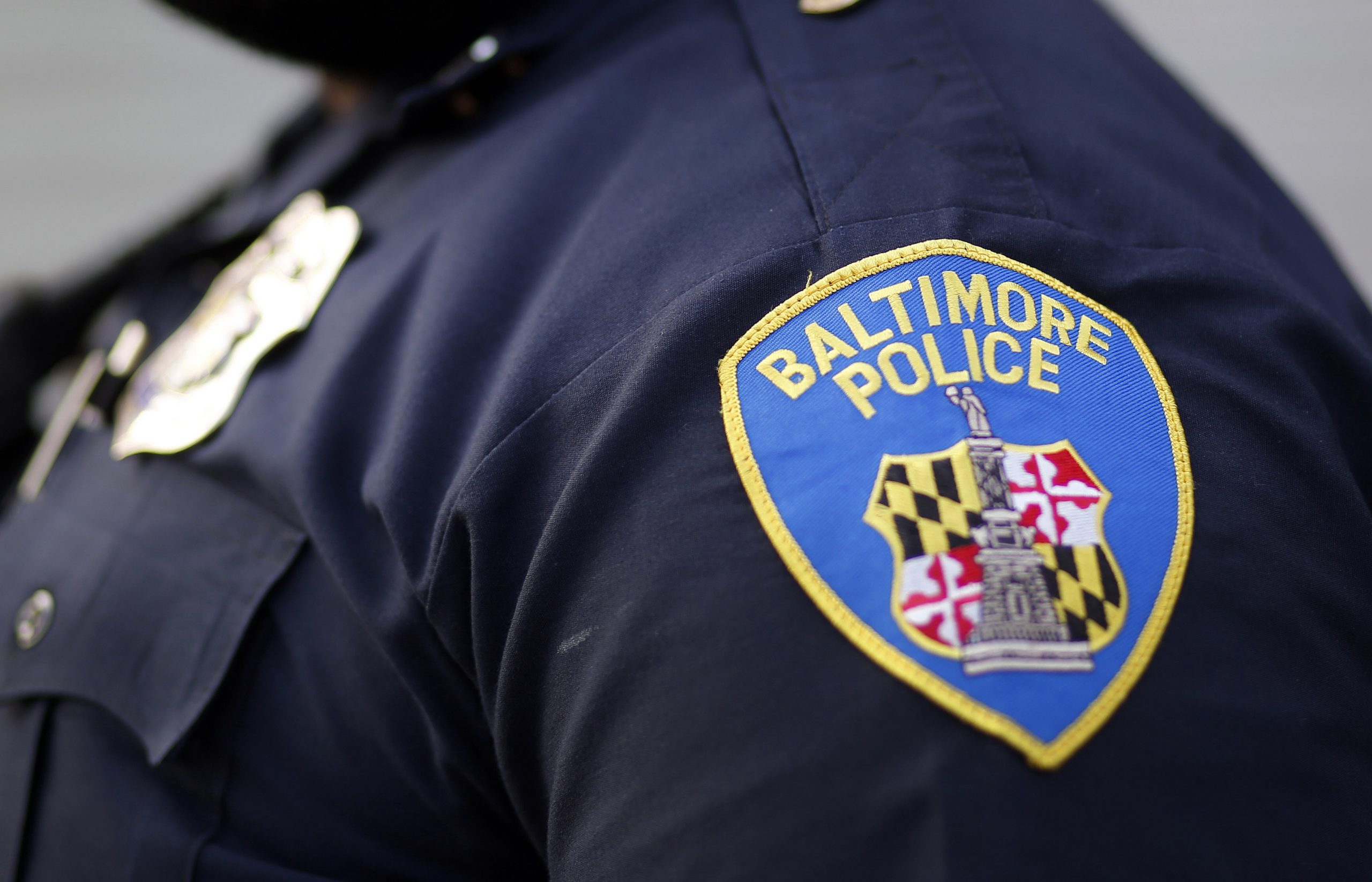 Police department fires employee who is a person of interest in homicide case