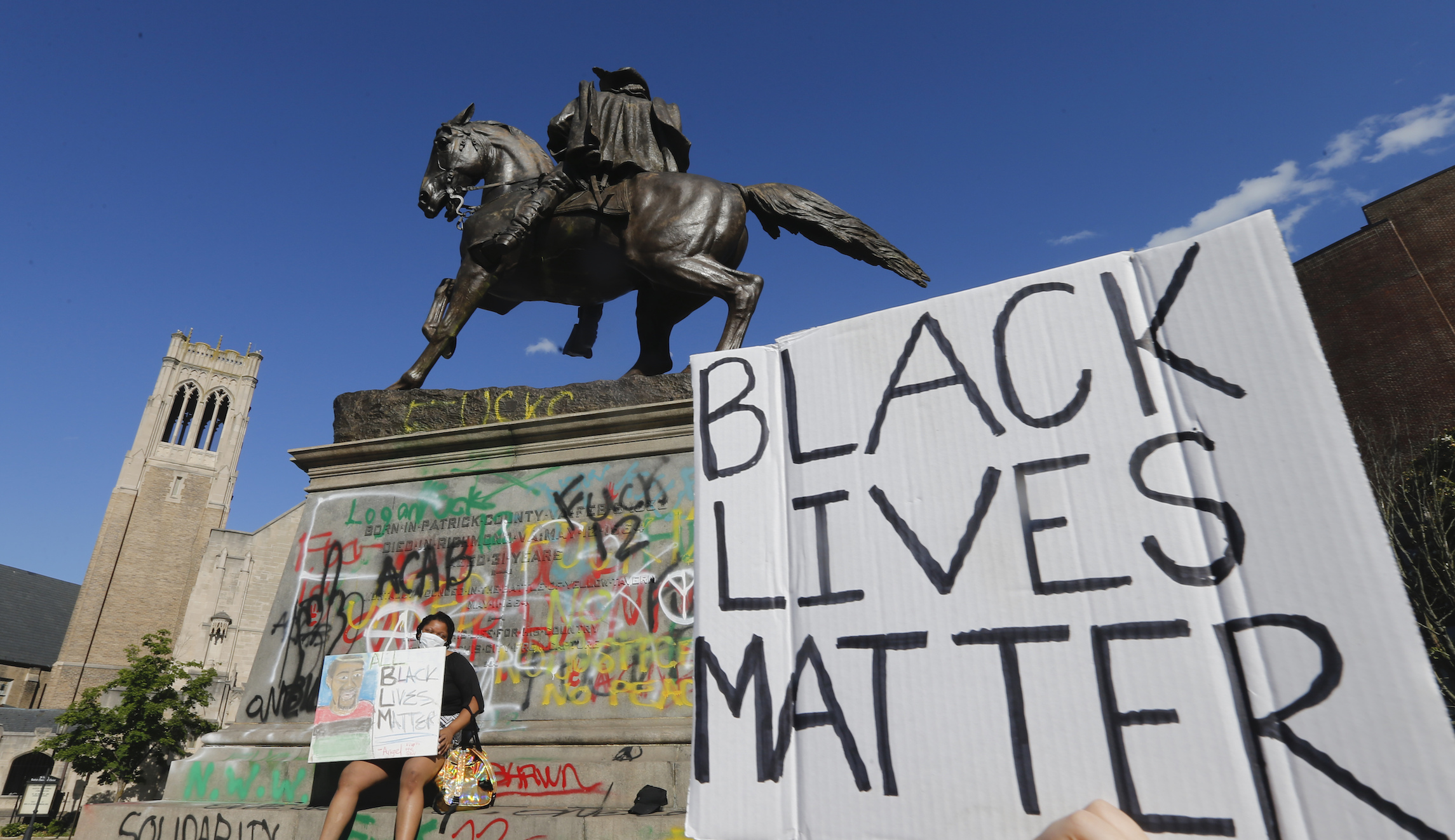 Confederate statue in Virginia removed a month early because of protests