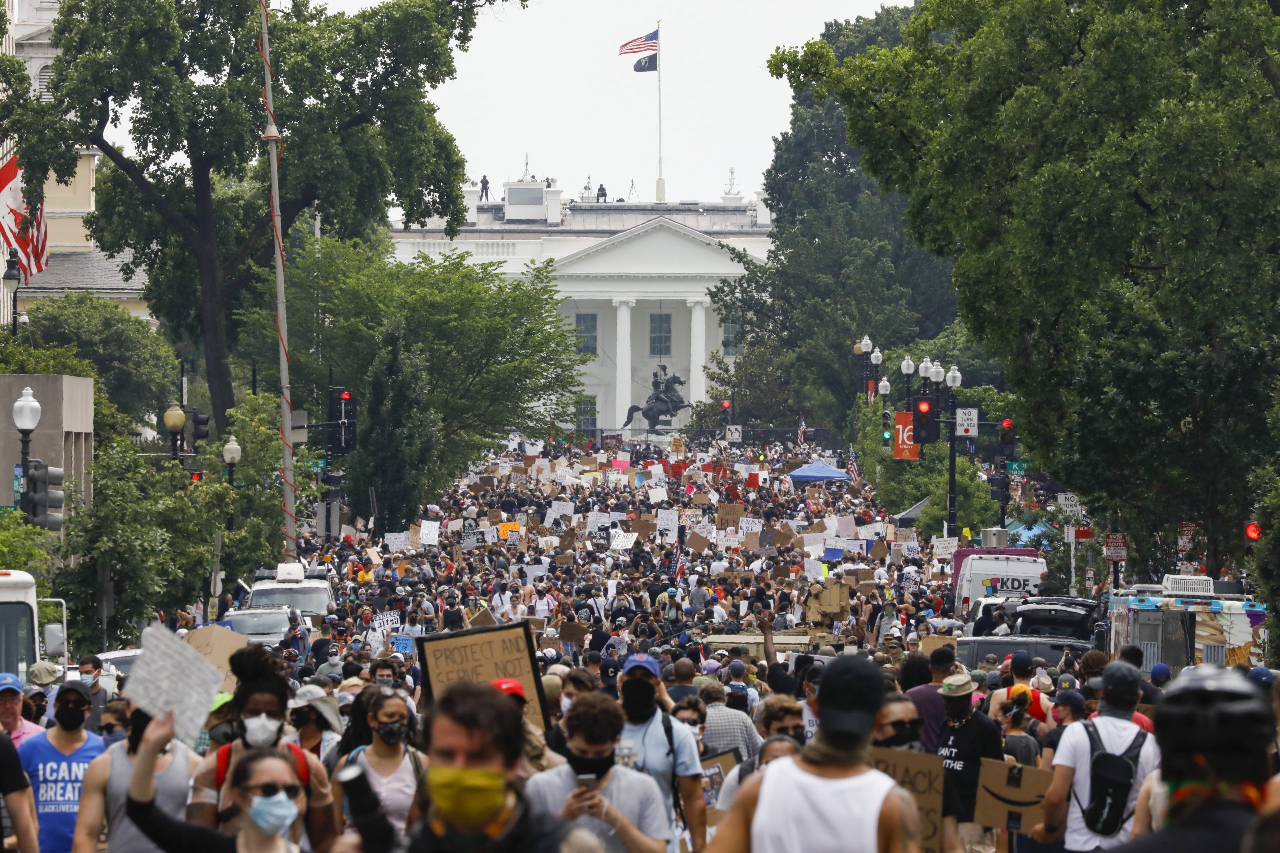 Demonstrators protest Saturday near the White House in Washington over the death of George Floyd, a black man who was in police custody in Minneapolis. Floyd died after being restrained by Minneapolis police officers.