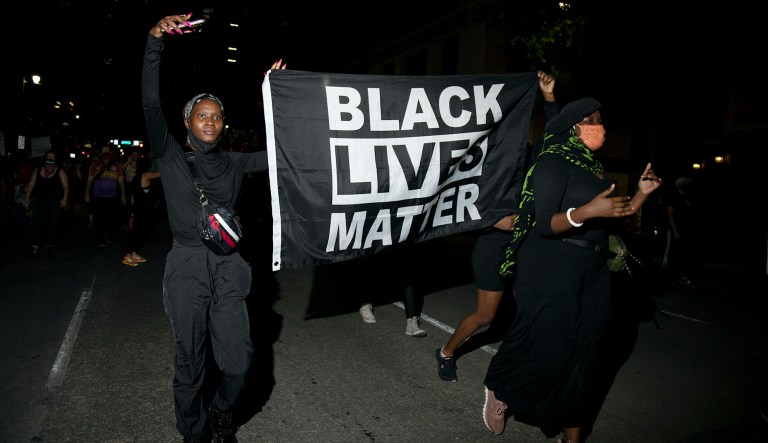 ‘I gotta go to work! I got bills’: Black motorist shouts at Black Lives Matter protesters to stop blocking highway