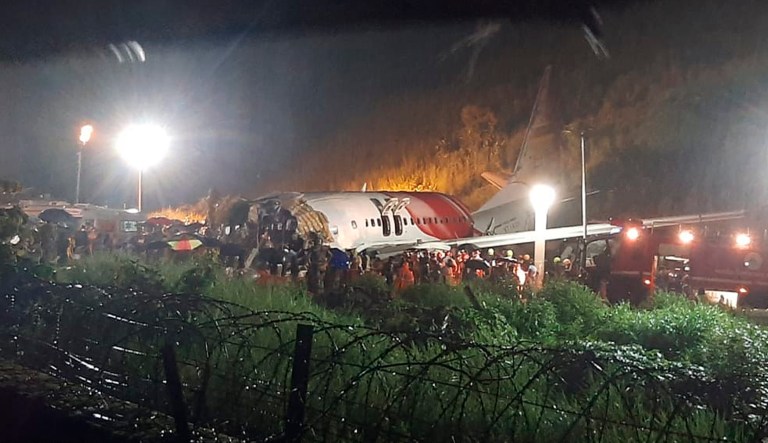 The Air India Express flight that skidded off a runway while landing at the airport in Kozhikode, Kerala state, India, Friday, Aug. 7, 2020. 