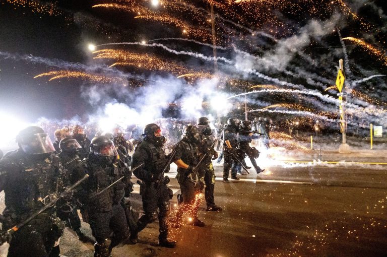 Protests like this in Portland, Ore. last month are considered "justified" by college students due to to racism.