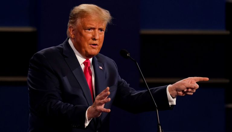 President Donald Trump gestures while speaking during the second and final presidential debate Thursday, Oct. 22, 2020, at Belmont University in Nashville, Tenn.