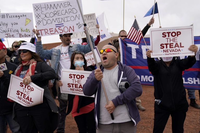 Supporters of President Donald Trump protest outside of the Clark County Elections Department in North Las Vegas, Nev., Saturday, Nov. 7, 2020. Republicans have uncovered several ballot abnormalities.