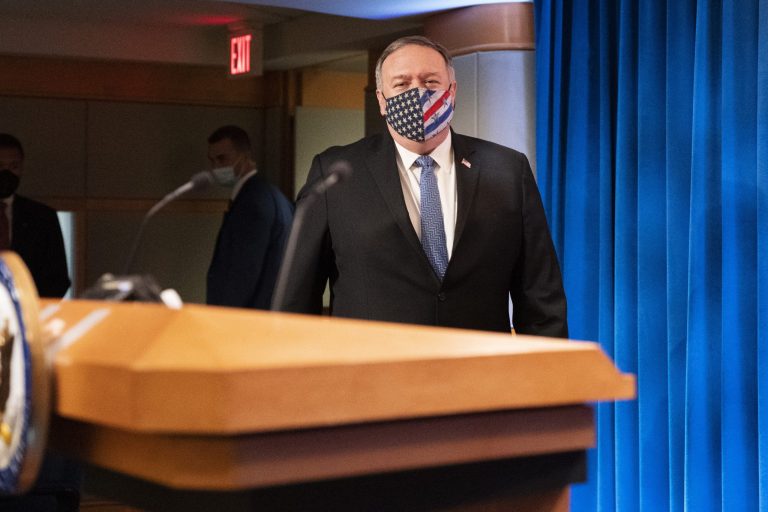 Secretary of State Mike Pompeo arrives for a media briefing, Tuesday, Nov. 10, 2020, at the State Department in Washington.