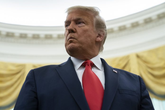 Trump weighs how best to make his mark with defense bill veto threat