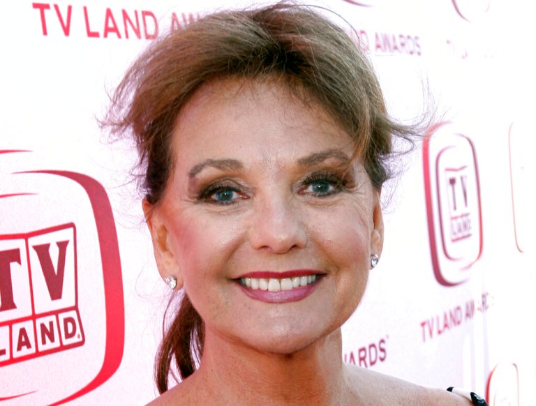 FILE - In this June 8, 2008 file photo, actress Dawn Wells arrives at the TV Land Awards in Santa Monica, Calif.  Wells, who played the wholesome Mary Ann among a misfit band of shipwrecked castaways on the 1960s sitcom "Gilligan's Island, died Wednesday, Dec. 30, 2020,  of causes related to COVID-19, her publicist said.(AP Photo/Matt Sayles)