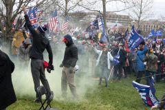 Man photographed at Capitol Hill riot taking Pelosi’s lectern arrested