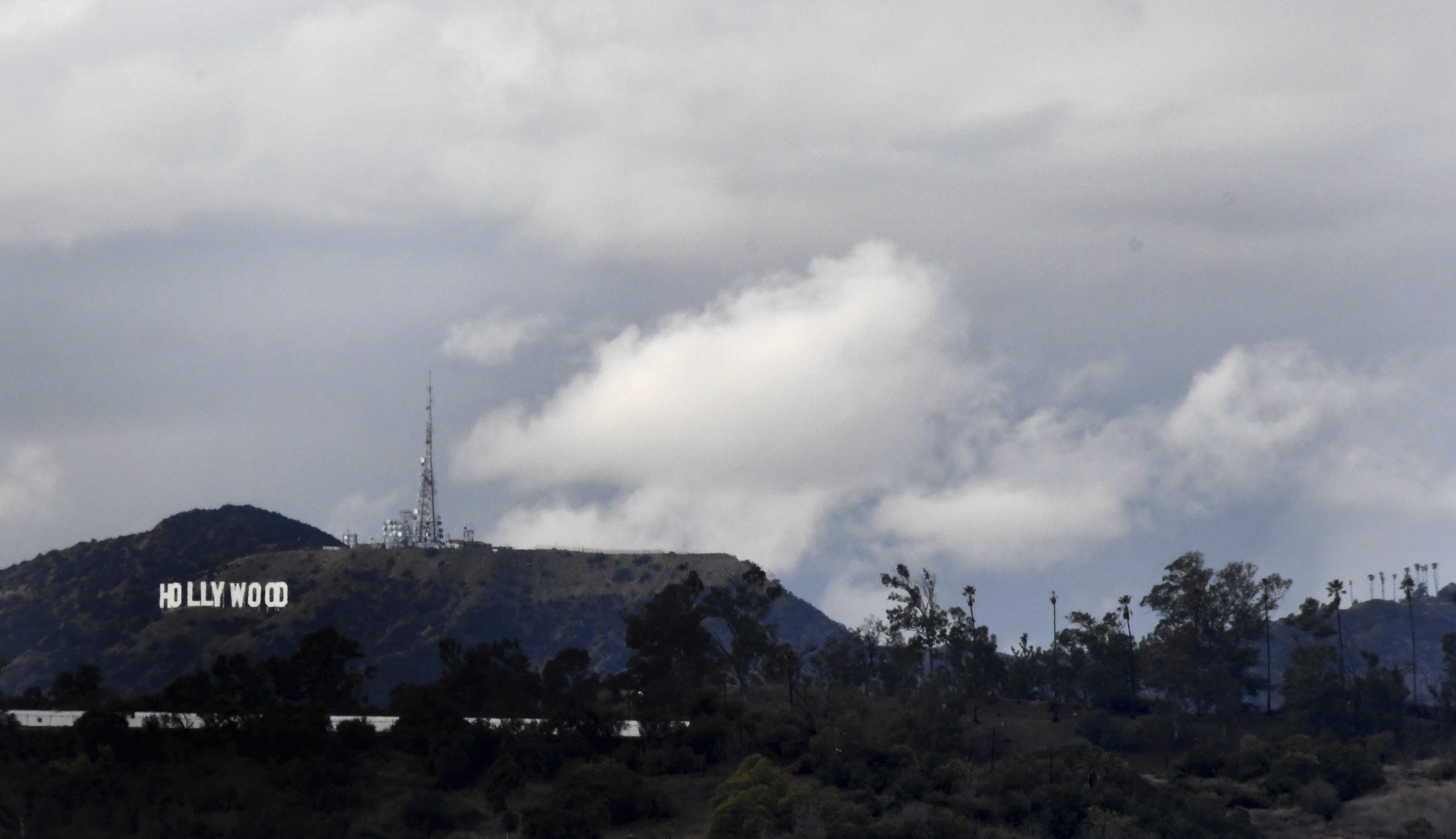 Six arrested after Hollywood sign changed to read ‘Hollyboob’