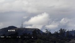 Six arrested after Hollywood sign changed to read ‘Hollyboob’
