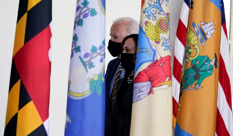 President Joe Biden and Vice President Kamala Harris walk back to the Oval Office after speaking about the American Rescue Plan, a coronavirus relief package, in the Rose Garden of the White House. 