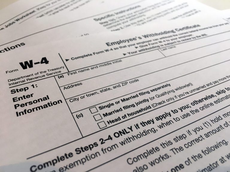 FILE - In this Feb. 5, 2020, file photo, a W-4 form is viewed in New York. (AP Photo/Patrick Sison, File)