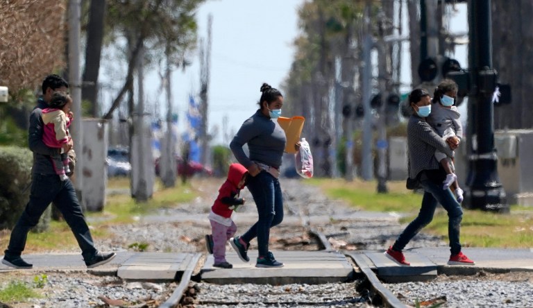 Texas border city pitches tents to quarantine COVID-19-positive migrants
