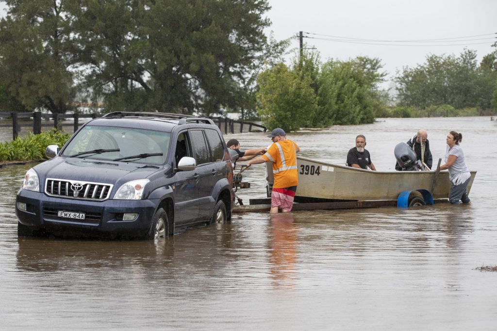 Australia roiled by natural disaster-level flooding