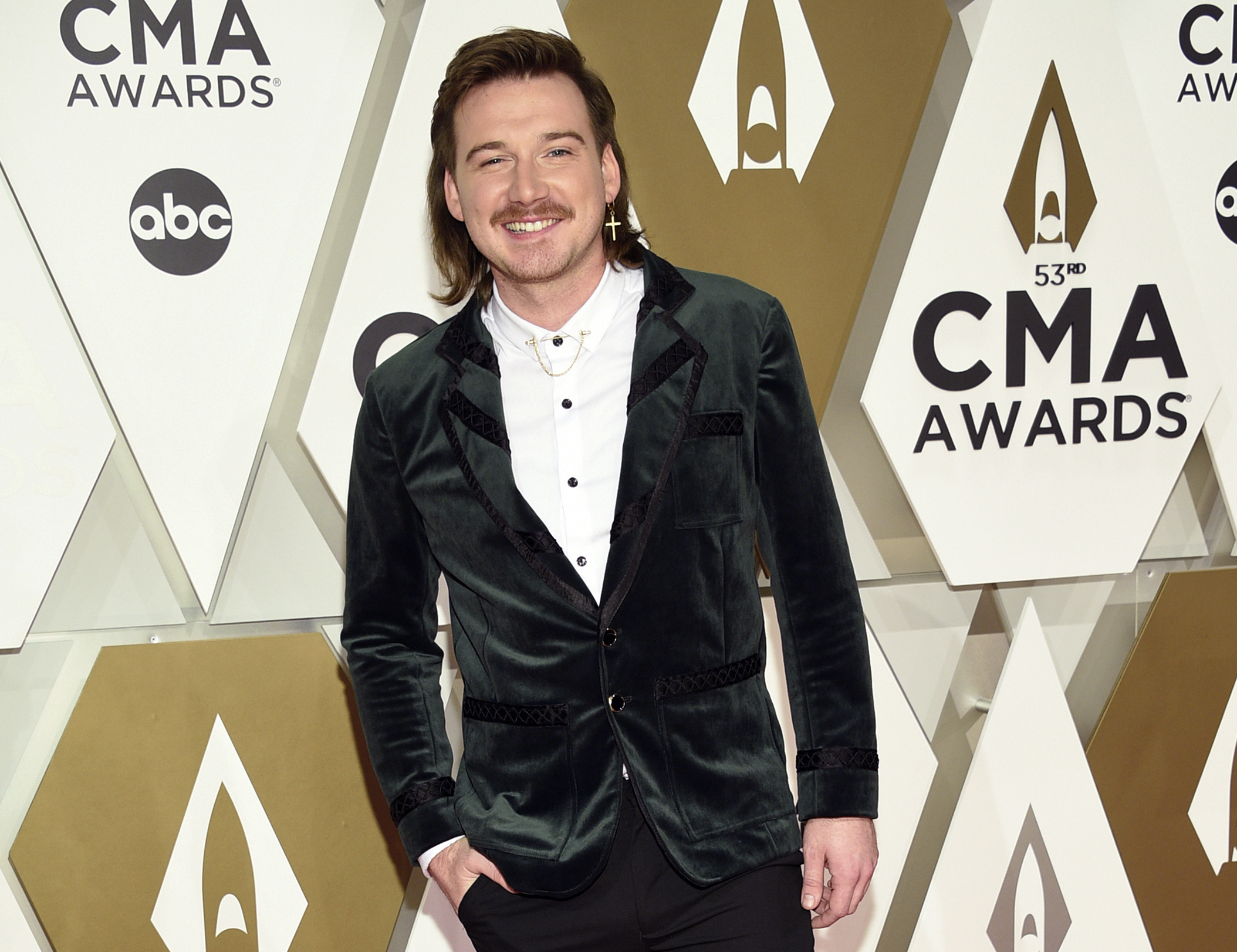 Past racial slur takes center stage as Morgan Wallen performs at Opry