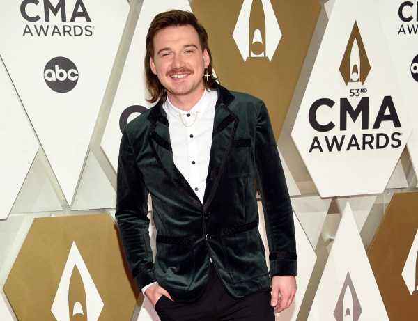 Past racial slur takes center stage as Morgan Wallen performs at Opry
