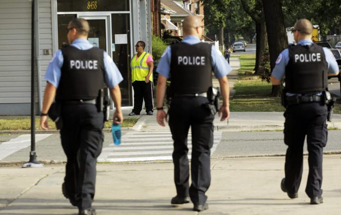 Chicago Police patrol the neighborhood. 